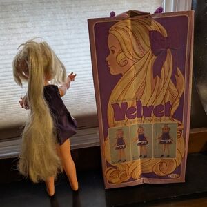 Velvet Doll with Blonde Hair and Purple Velvet Dress